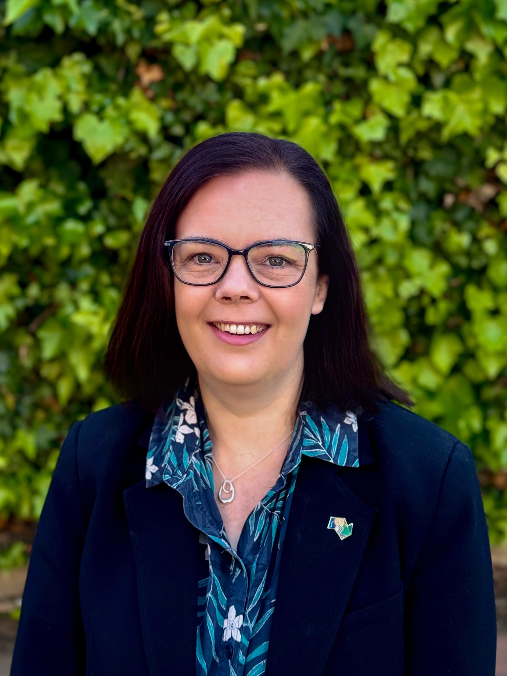 A headshot of Bec Curtain, Executive Director of Workforce and Quality