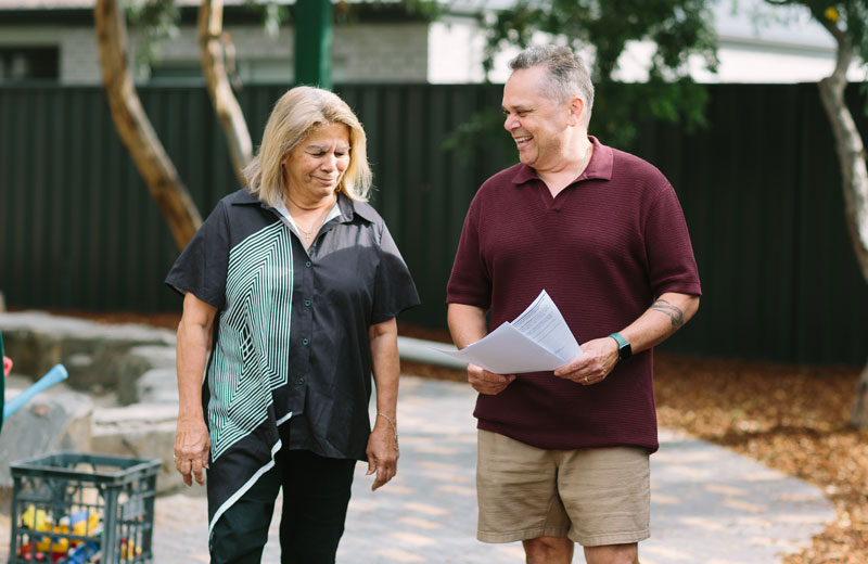 Two preschool educators walking together
