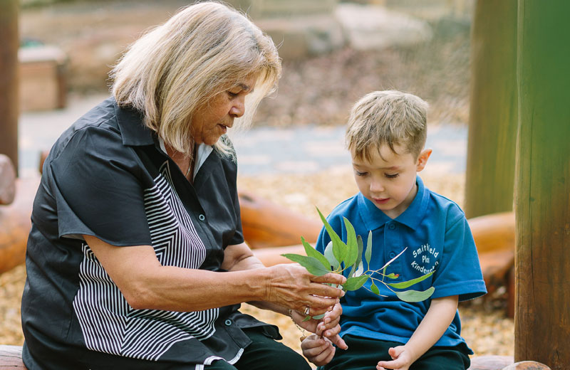 An educator with a child