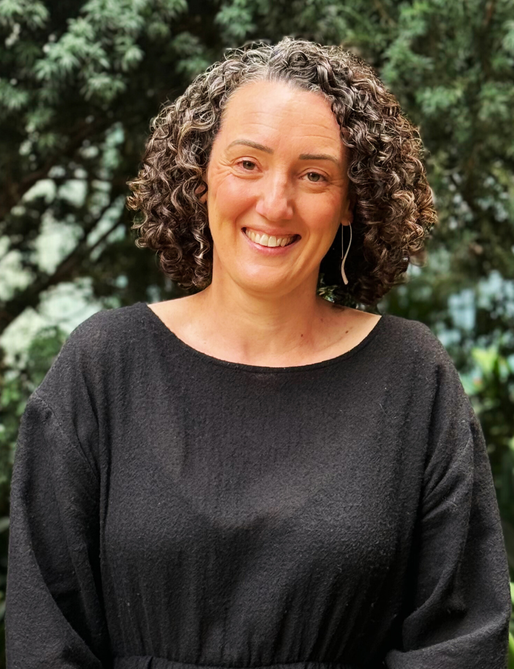 A headshot of Natalie Atkinson, Executive Director of Participation, Integration and Inclusion